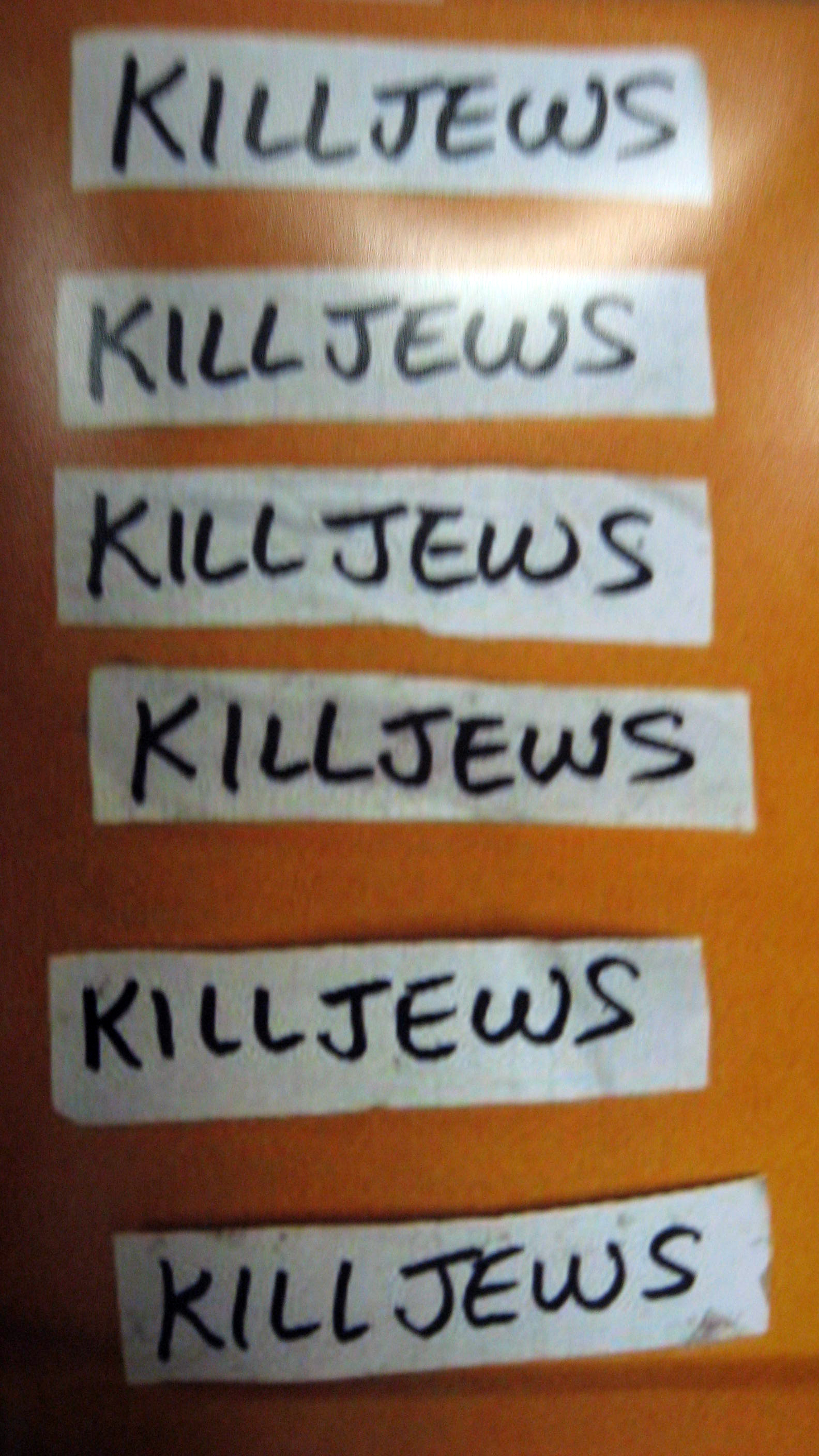 A close-up of one of the notes threatening Jews in Nassau County - Mineola, NY - Nov 3, 2010 - Photo: Mona Rivera / 1010 WINS