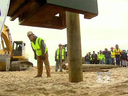Piling for new Belmar boardwalk gets driven into the sand Jan. 9, 2013 (credit: CBS 2)