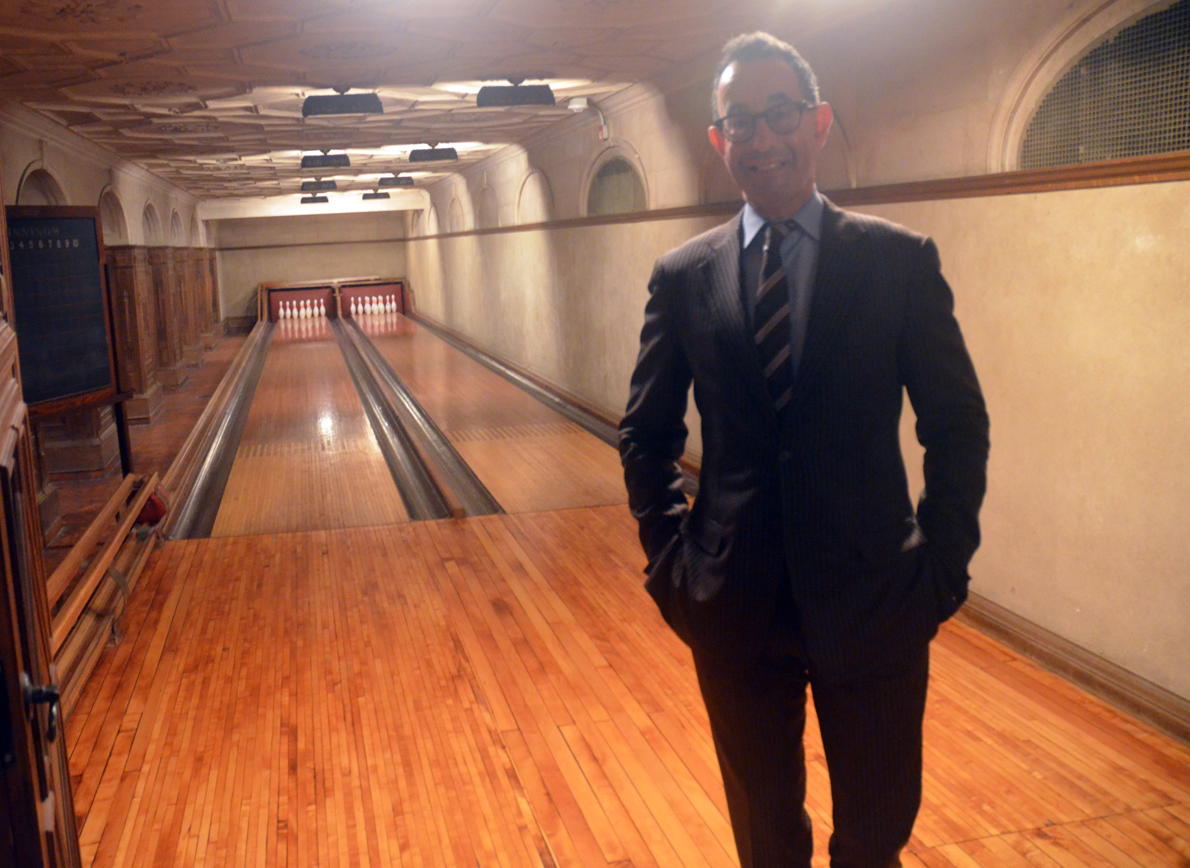 Colin Bailey poses for the camera at the Frick Collection bowling alley in late 2012 (credit: Evan Bindelglass / CBSNewYork)
