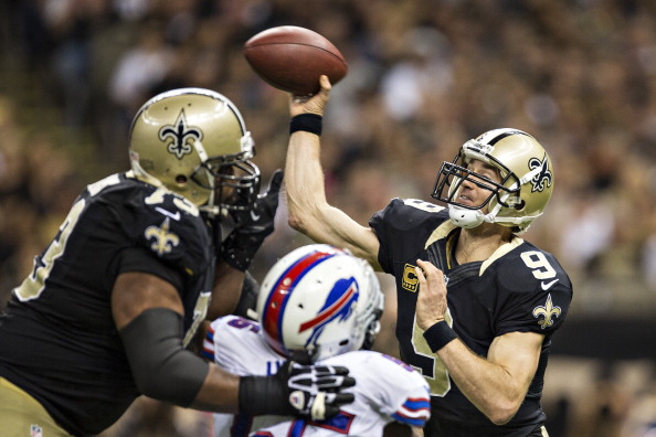 NEW ORLEANS, LA - OCTOBER 27: Drew Brees #9 of the New Orleans Saints throws a pass against the Buffalo Bills at Mercedes-Benz Superdome on October 27, 2013 in New Orleans, Louisiana. The Saints defeated the Bills 35-14. (Photo by Wesley Hitt/Getty Images)