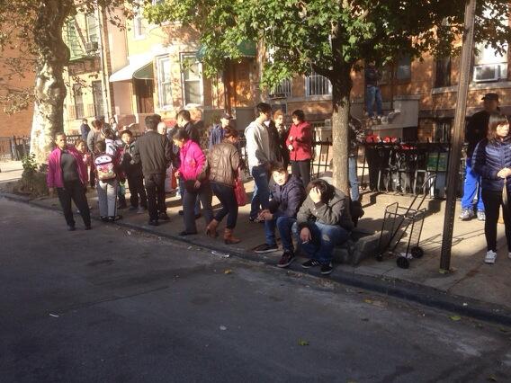 Neighbors gather outside Zhou family home on Oct. 28, 2013. (credit: Tony Aiello/CBS 2)