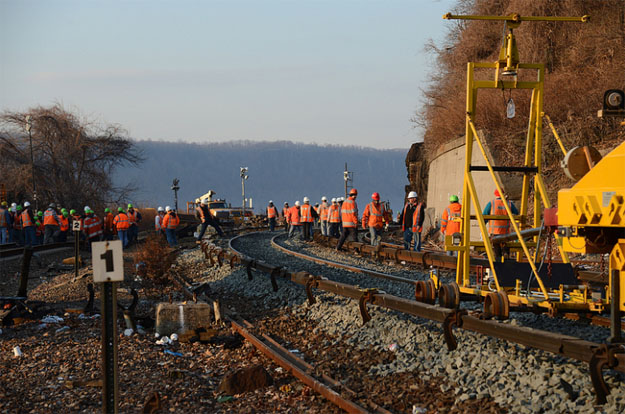 Metro-North crews working on Tuesday, Dec. 3, to rebuild tracks that were damaged in Sunday's derailment in the Bronx. (Credit: MTA)