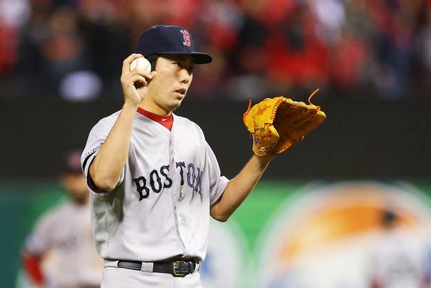 ST LOUIS, MO - OCTOBER 27:  Koji Uehara #19 of the Boston Red Sox looks on in the ninth inning against St. Louis Cardinals during Game Four of the 2013 World Series at Busch Stadium on October 27, 2013 in St Louis, Missouri.  