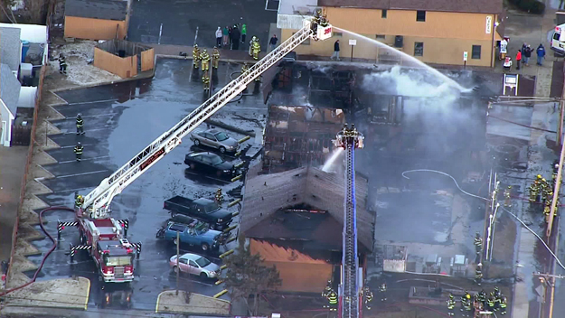 Firefighters battle a motel blaze in Point Pleasant Beach, NJ on March 21, 2014. (credit: CBS 2)