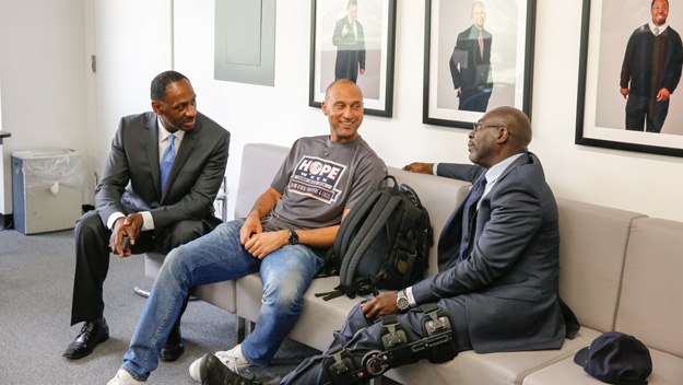 Yankees captain Derek Jeter chats with Career Gear participants Rodney Gordon and Rodney Whaley on June 17, 2014. (Credit: Yankees)