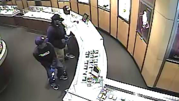 Surveillance image of three suspects police said are wanted for a smash and grab robbery at the Tourneau watch store in the Westchester Mall in White Plains, NY on Aug. 17, 2014. (credit: White Plains Police)