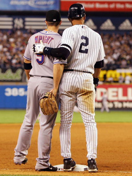 Derek Jeter pats David Wright on the back on June 15, 2007.  (Photo by Jim McIsaac/Getty Images)