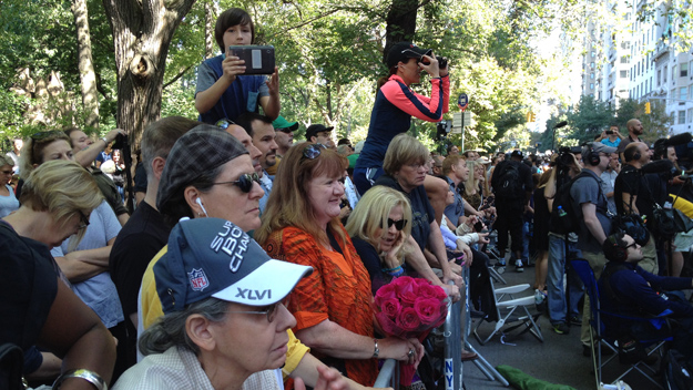 Fans and media line up across the street from the private funeral for Joan Rivers on Sept. 7, 2014, at Temple Emanu-El on the Upper East Side. (credit: Jim Smith/WCBS 880)
