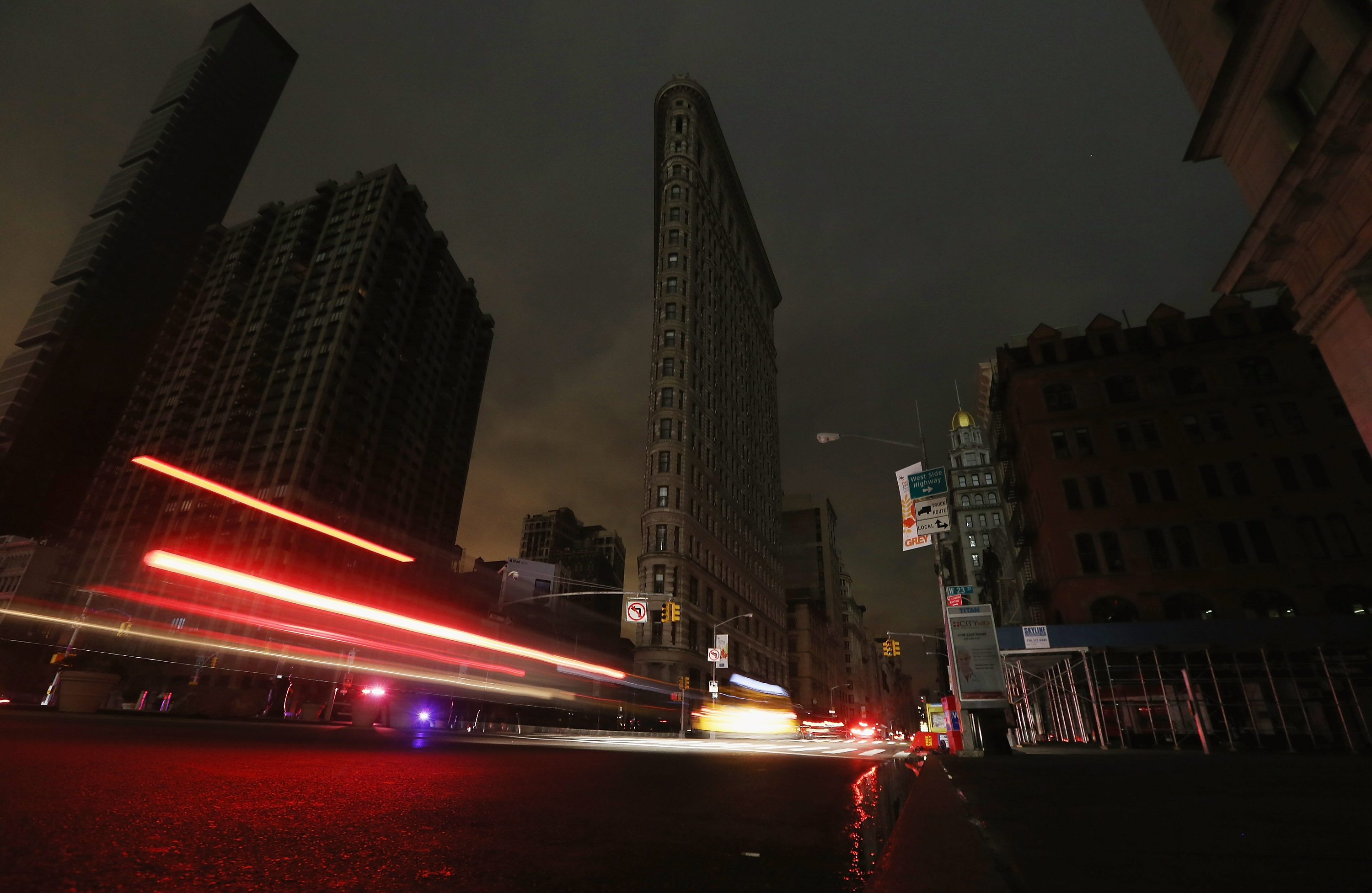 A darkened Flatiron Building rises over an empty street in a section of Manhattan still in a blackout following Hurricane Sandy on October 30, 2012. (credit: Mario Tama/Getty Images) 