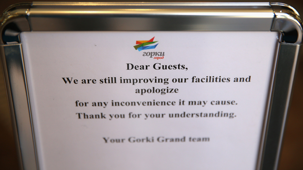 A sign explaining delays at the Gorky Grand hotel prior to the 2014 Winter Olympics at the Mountain Cluster on February 3, 2014 in Sochi, Russia. (Photo by Julian Finney/Getty Images) 