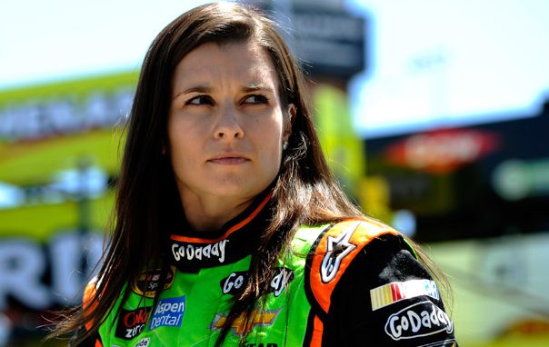 KANSAS CITY, KS - MAY 09: Danica Patrick, driver of the #10 GoDaddy Chevrolet, stands in the garage area during practice for the NASCAR Sprint Cup Series 5-Hour Energy 400 at Kansas Speedway on May 9, 2014 in Kansas City, Kansas.