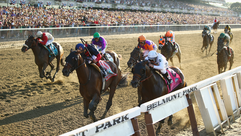 Tonalist #11, ridden by Joel Rosario, races to the finish line en route to winning the 146th running of the Belmont Stakes at Belmont Park on June 7, 2014 in Elmont, New York. California Chrome #2 tied for fourth in his bid for the Triple Crown. (Photo by Al Bello/Getty Images)