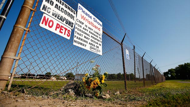 Flowers lay next to the front entrance of the Canandaigua Motorsports Park on August 10, 2014. Tony Stewart hit and killed sprint car driver Kevin Ward Jr. during a dirt track race the day prior after Ward Jr. had exited his car.  (Photo by Jared Wickerham/Getty Images)