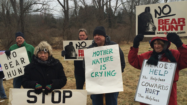 Opponents of New Jersey's bear hunts hold a protest Dec. 8, 2014. (credit: Rebecca Granet/1010 WINS)