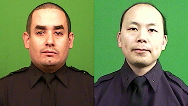 Officers Rafael Ramos, Wenjian Liu, who were killed in their patrol car on Dec. 20, 2014. (Credit: NYPD)