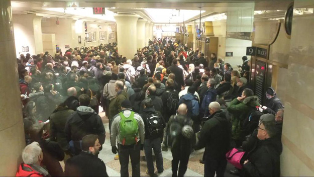 Commuters wait at Penn Station ahead of a massive winter storm  on Jan. 26, 2015. (credit: Marla Diamond/WCBS 880)