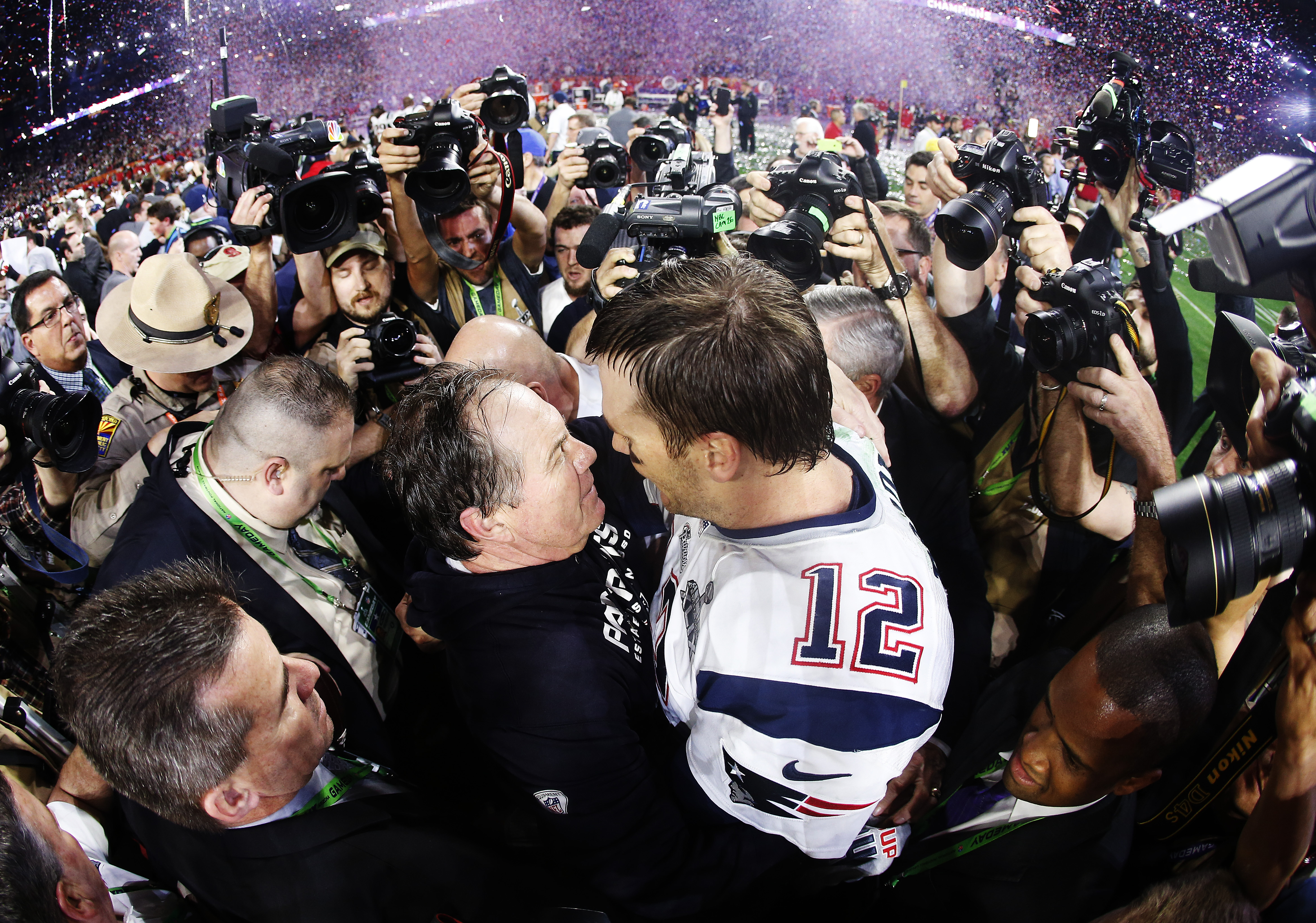 Tom Brady #12 of the New England Patriots celebrates with head coach Bill Belichick after defeating the Seattle Seahawks 28-24 during Super Bowl XLIX at University of Phoenix Stadium on February 1, 2015 in Glendale, Arizona.  (Photo by Christian Petersen/Getty Images)