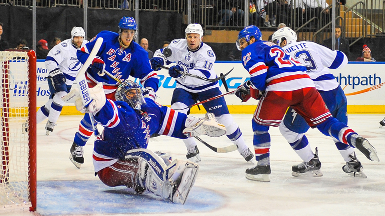 Henrik Lundqvist makes a save against the Tampa Bay Lightning at Madison Square Garden on November 17, 2014. (Photo by Alex Goodlett/Getty Images)