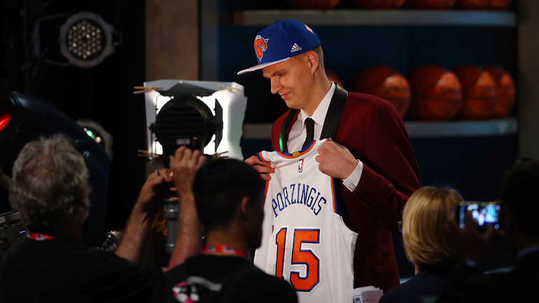 Kristaps Porzingis speaks to the media after being selected fourth overall by the New York Knicks in the first round of the 2015 NBA Draft at the Barclays Center on June 25, 2015. (Photo by Elsa/Getty Images)