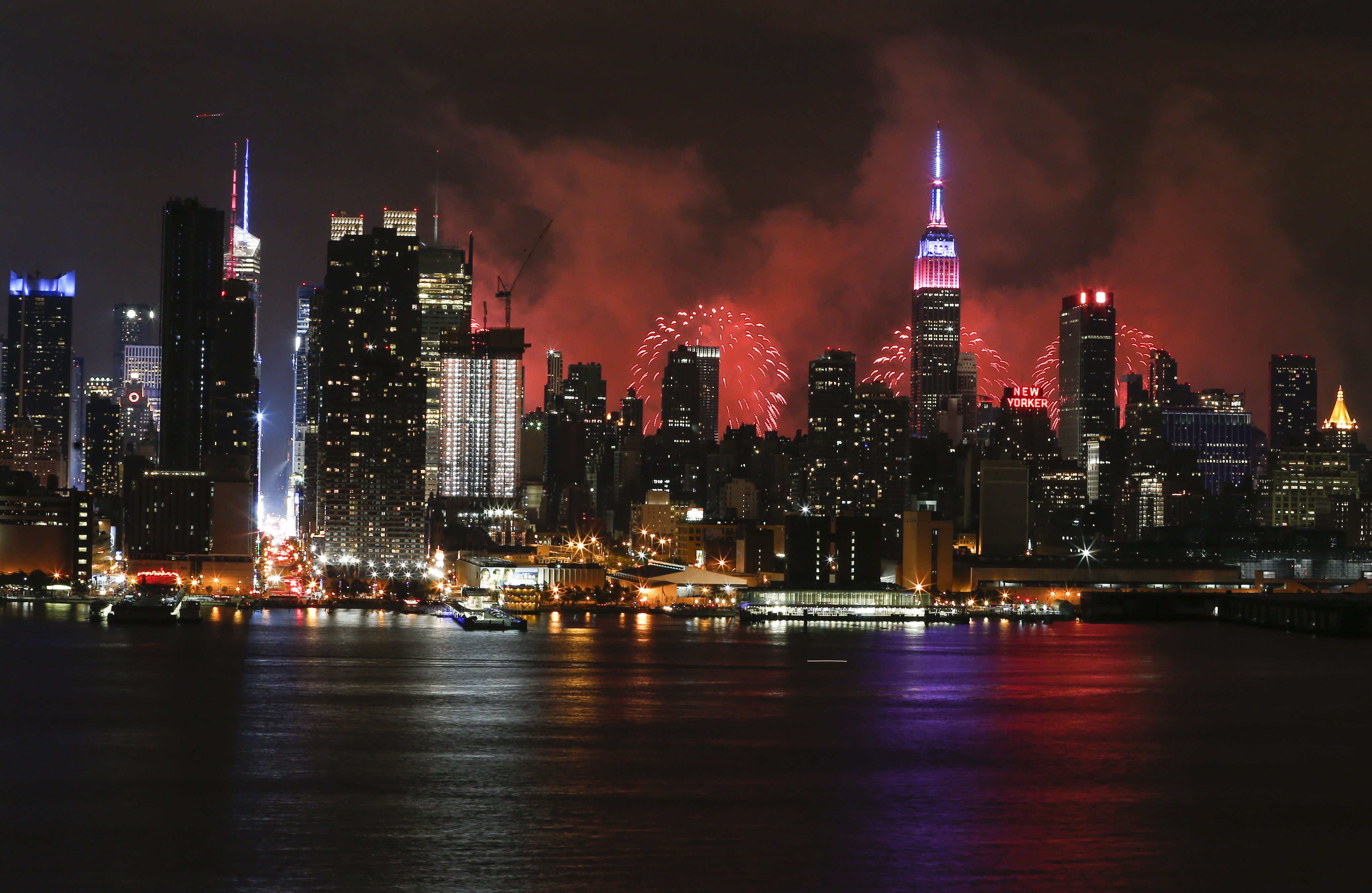 Fireworks light up the New York City skyline during 39th annual Macy's 4th of July fireworks for Independence day as seen from Weehawken, New Jersey on July 4, 2015 . (Credit: Kena Betancur/ AFP/Getty Images)