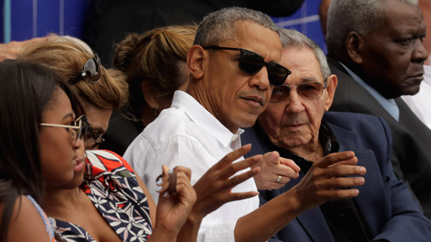 U.S. President Barack Obama and Cuban President Raul Castro visit during an exhibition game between the Cuban national team and the Tampa Bay Devil Rays on March 22, 2016, in Havana, Cuba.(Photo by Chip Somodevilla/Getty Images)
