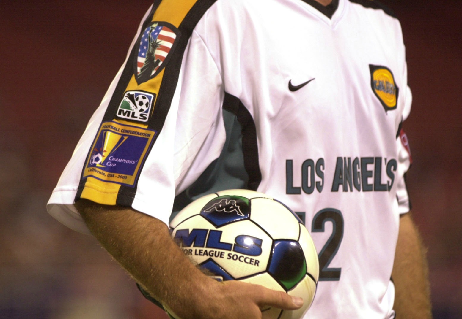 Simon Elliott of the L.A. Galaxy and the rest of the players wore a patch of the Statue of Liberty on their right shoulder to honor the victims of the World Trade Center disaster during their game against the New York/New Jersey MetroStars at Giants Stadium in East Rutherford, New Jersey, on Sept. 26, 2001. (Photo by Ezra Shaw/ALLSPORT)