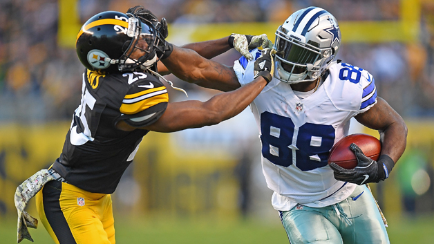 Dez Bryant #88 of the Dallas Cowboys stiff arms Artie Burns #25 of the Pittsburgh Steelers after a reception in the first quarter during the game at Heinz Field on November 13, 2016 in Pittsburgh, Pennsylvania.