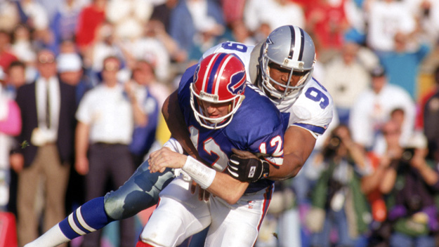 Cowboys defensive end Charles Haley hits Bills quarterback Jim Kelly in Super Bowl XXVII on Jan. 31, 1993, at the Rose Bowl in Pasadena, California. (Photo by George Rose/Getty Images)