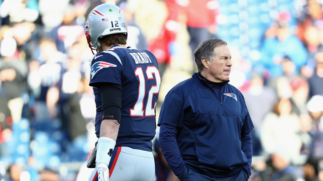 Tom Brady #12 of the New England Patriots and head coach Bill Belichick look on during warm ups before the AFC Championship Game against the Jacksonville Jaguars at Gillette Stadium on January 21, 2018 in Foxborough, Massachusetts.